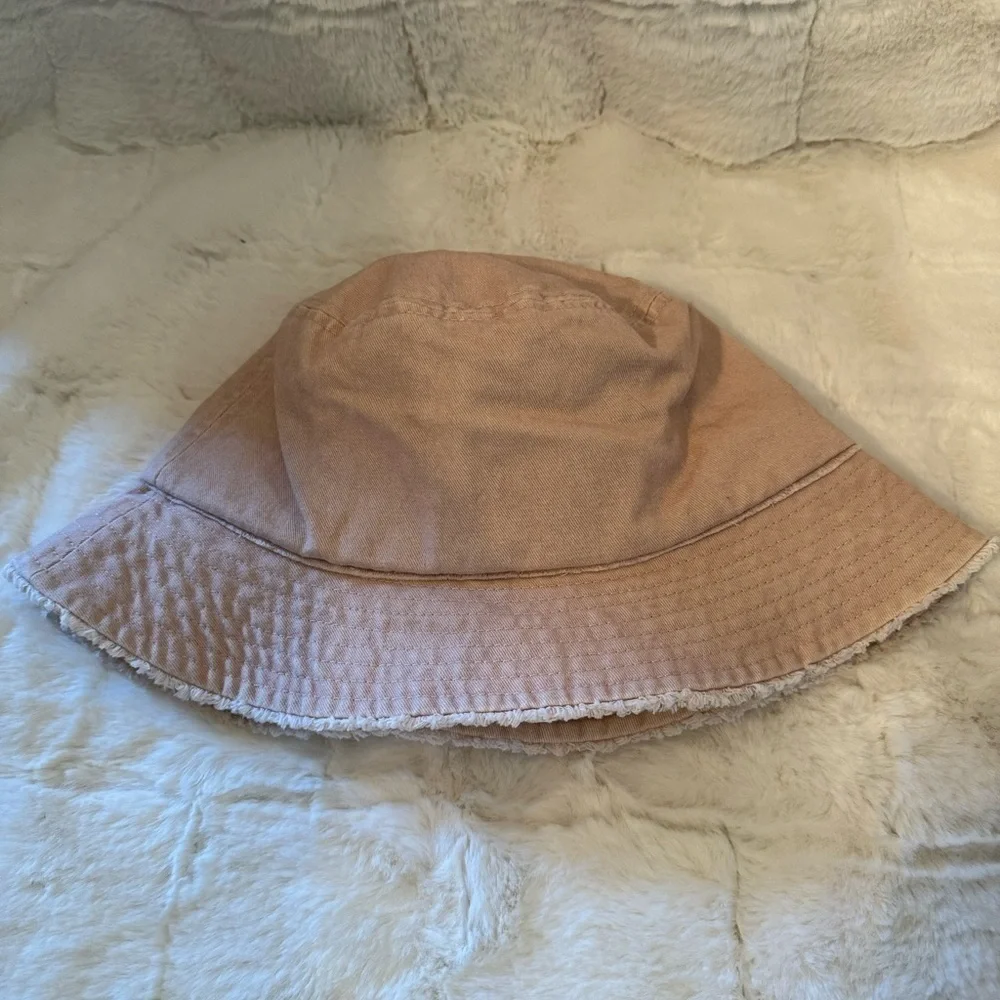 David and Young Khaki colored Bucket Hat. Has a Butterfly on the front New